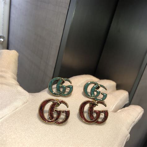 fake gucci hoop earrings|gucci multi stone earrings.